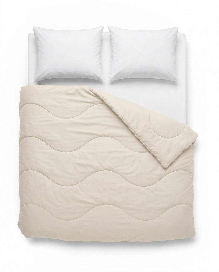 VANBRUINN Mono Creme van bovenaf op bed