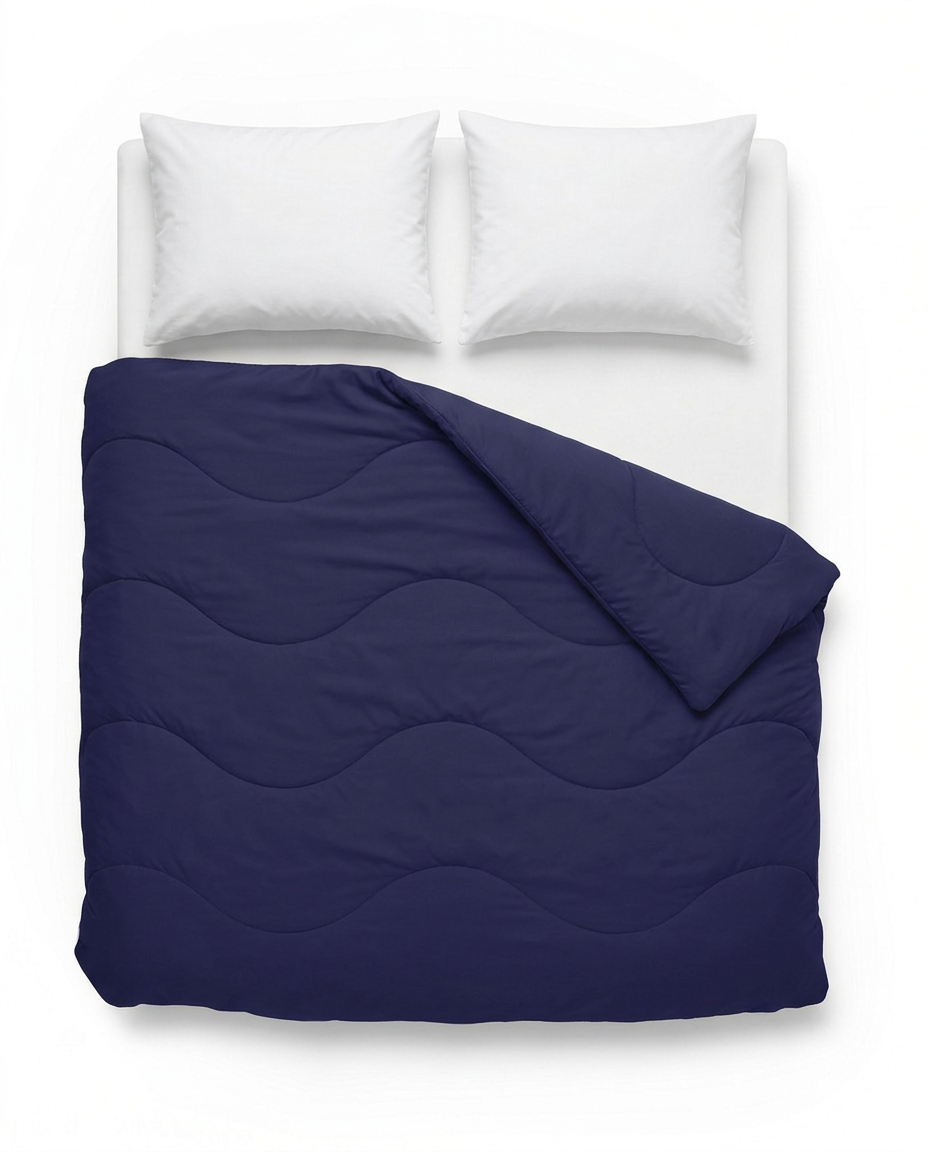 VANBRUINN Mono Donkerblauw van bovenaf op bed