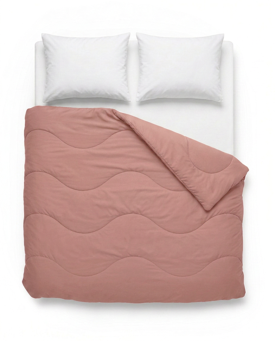 VANBRUINN Mono Lichtroze van bovenaf op bed