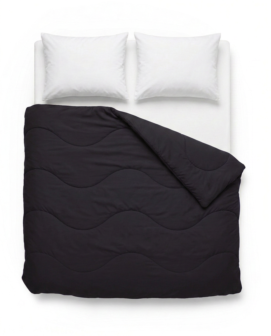 VANBRUINN Mono Zwart van bovenaf op bed